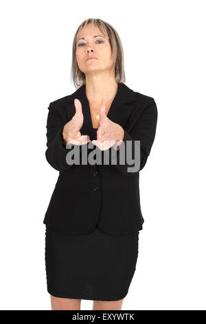 Beautiful woman doing different expressions in different sets of clothes: gun sign Stock Photo