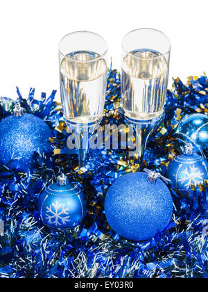 above view of two glasses of champagne at blue Christmas decorations isolated on white background Stock Photo