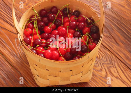 It lies in a basket Cherry Stock Photo