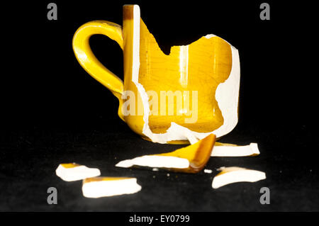 Broken Orange Coffe Cup Stock Photo
