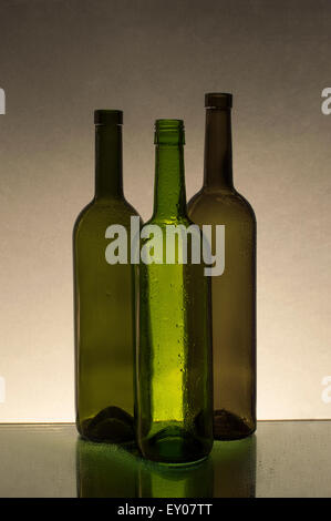 Wet empty glass bottles Stock Photo
