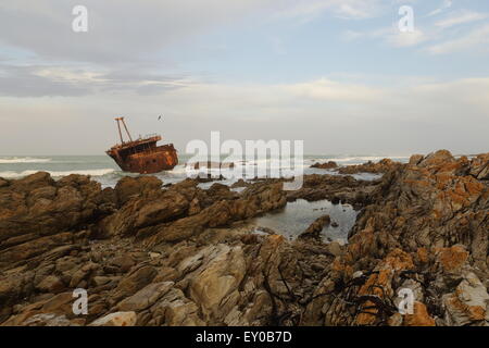 Shipwreck  of the Meisho Maru (a Japanese fishing vessel) off the South African coast close to Cape Agulhas, viewed at sunrise Stock Photo