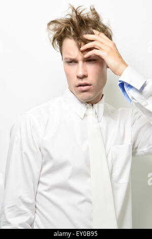 Young man with messy shirt and tie Stock Photo - Alamy