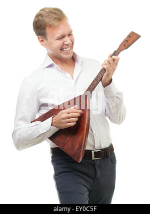 Excited young man playing balalaika, isolated on white Stock Photo