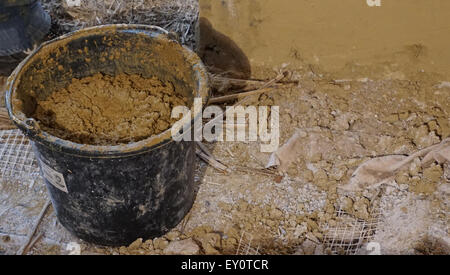 Bucket cement mix with on construction site the ingredients. Brick, Stone,  Mortar, Sand Stock Photo - Alamy