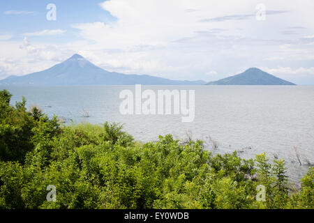 Momotombo and Momotombito volcanoes on the Managua lake, Nicaragua Stock Photo