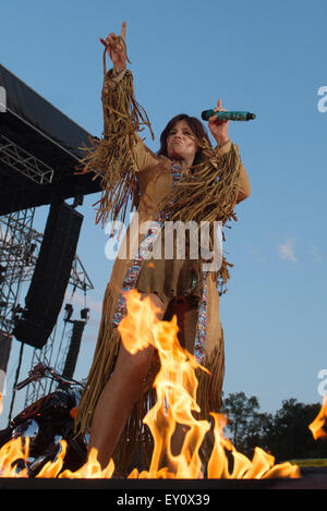 Aspach, Germany. 18th July, 2015. Singer Andrea Berg performs on stage during her concert tour 'Heimspiel' (lit. home match) in Aspach, Germany, 18 July 2015. Credit:  dpa picture alliance/Alamy Live News Stock Photo