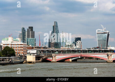 London skyline with Thames river, Blackfriars Bridge, modern skyscrapers and cranes Stock Photo