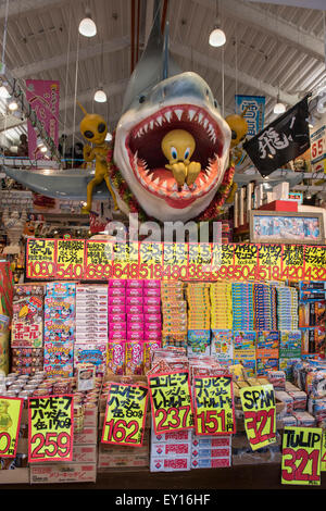 Souvenir Shop on Kokusai Dori with Tweety Bird and Great White Shark  Display in Naha, Okinawa, Japan Stock Photo