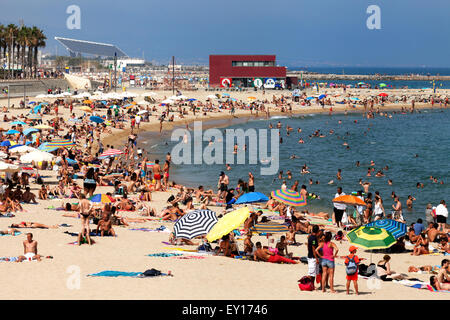 Spain Barcelona crowded beach Platja de la Barceloneta people Sculture ...