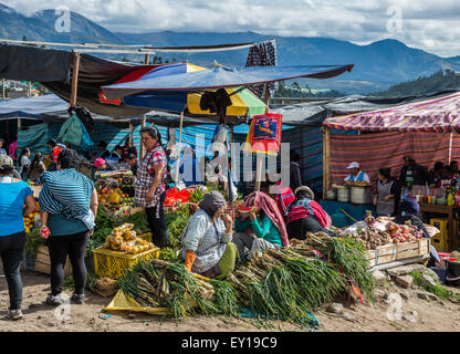 Fresh vegetable stands at weekend market. Otavalo, Ecuador. Stock Photo