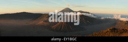 Sunrise over Mount Bromo (2,329 m) and the Tengger Caldera in East Java, Indonesia. Panorama from Mount Penanjakan (2,770 m). Mo Stock Photo