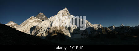 Sunset over Mount Everest (8,848 m) and Mount Nuptse (7,861 m) in Khumbu region, Himalayas, Nepal. Panorama from the point on th Stock Photo