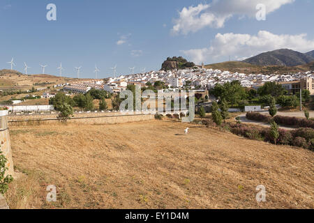 Tipical andalusian village (pueblo blanco) at the foot of the mountain Stock Photo