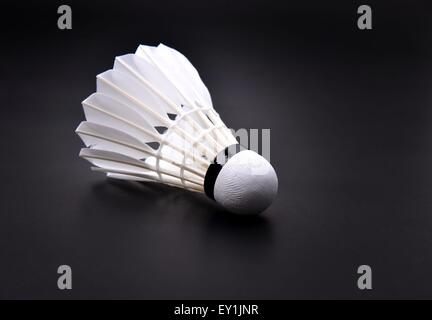 new shuttlecock on dark floor Stock Photo