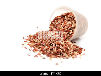 milled rice imperfectly cleaned in measuring cup Stock Photo