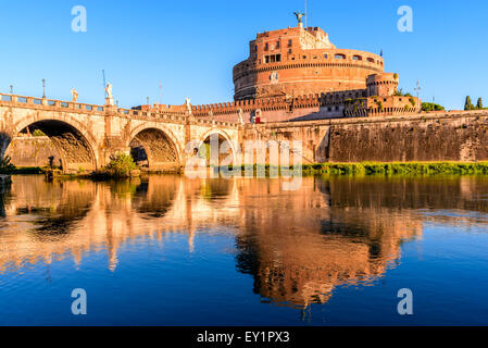 Rome, Italy. Bridge and Castel Sant Angelo and Tiber River. Built by Hadrian emperor as mausoleum in 123AD ancient Roman Empire. Stock Photo