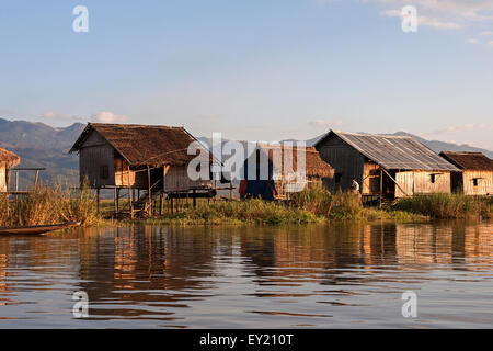 Traditional stilt houses on the Inle Lake, evening light, Shan State, Myanmar Stock Photo