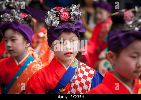 KYOTO, JAPAN - JULY 7: little Japanese girls in geisha makeup and kimono during Tanabata Festival celebrations Stock Photo