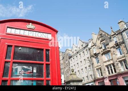 View of Victoria Street architecture  with red British phone box in the foreground Stock Photo