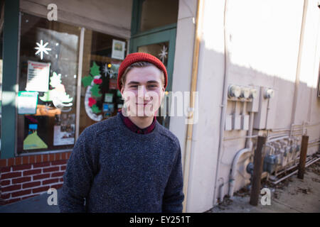 Portrait of young man wearing beanie hat Stock Photo