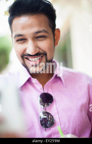 Close up portrait of young businessman on street Stock Photo