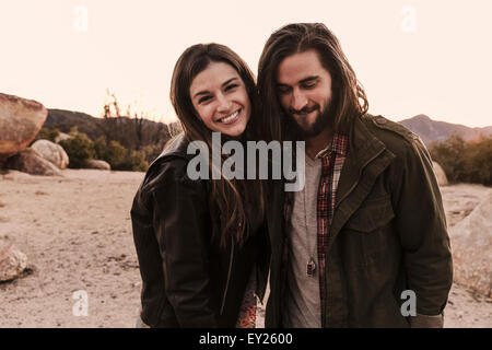 Portrait of young couple in desert, Los Angeles, California, USA Stock Photo