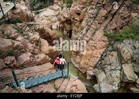 Shijiazhuang, China's Hebei Province. 18th July, 2015. People visit Sanggan River canyon in Xuanhua County, north China's Hebei Province, July 18, 2015. © Yang Shiyao/Xinhua/Alamy Live News Stock Photo