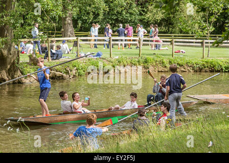 Young people enjoying a day boating on the The River Cherwell in Oxford, Oxfordshire, England, UK