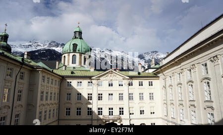 hofburg palace with snow mountains background, Innsbruck, Austria Stock Photo