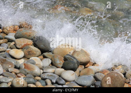 Beautiful stones with ocean wave Stock Photo