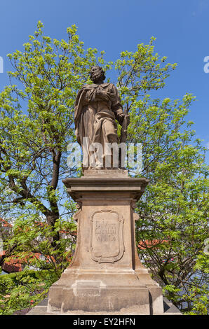 Statue of St. Jude Thaddeus (circa 1708) on the balustrade of famous Charles Bridge in Prague (UNESCO site) Stock Photo