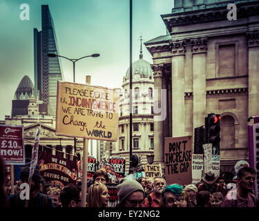 Anti-austerity march in the City of London on 20th June 2015 with landmark city buildings in the background