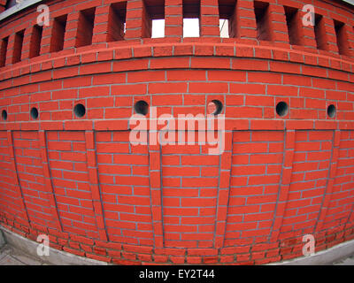Red brick wall  with wide angle fisheye view Stock Photo