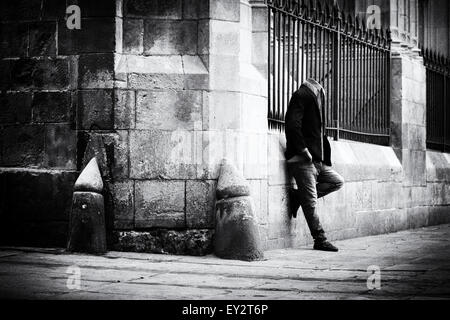 Street photography - Black & White image of headless street performer by the cathedral, Gothic Quarter ( Barri Gotic ), Barcelona Spain Europe Stock Photo