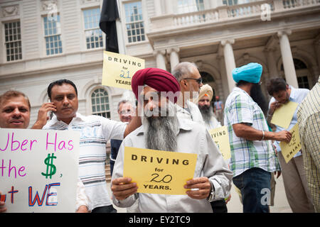 New York, USA. 20th July, 2015. Taxi drivers and supporters rally on the steps of New York City Hall on Monday, July 20, 2015 for a cap on For-Hire-Vehicles (FHV) allowed on the city's streets, specifically e-hail services like Uber and Lyft. The New York City Council is scheduled to vote on the cap and both Uber and the Taxi Industry are lobbying the councilmembers. Credit:  Richard Levine/Alamy Live News Stock Photo