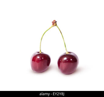 Two burgundy sweet cherries isolated on white background Stock Photo