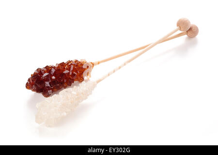 White and brown sticks of sugar. Stock Photo