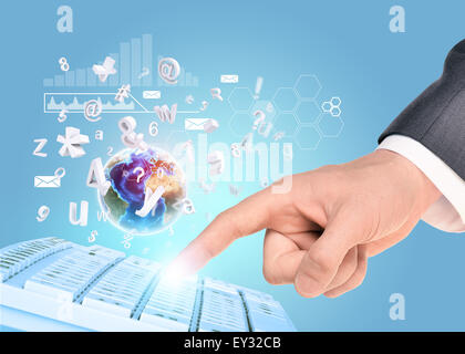Businessmans hand with graphical charts Stock Photo