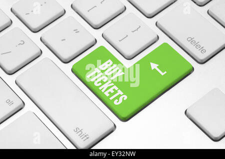 Buy tickets on the computer keyboard Stock Photo
