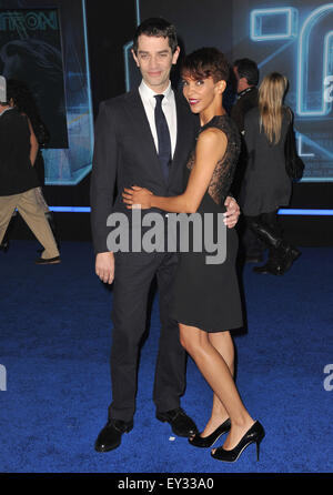 LOS ANGELES, CA - DECEMBER 11, 2010: James Frain & wife Marta Cunningham at the world premiere of his new movie 'Tron: Legacy' at the El Capitan Theatre, Hollywood. Stock Photo