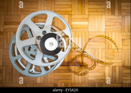 cinema projector with movie reels on the wooden floor. 3D rendering Stock  Photo - Alamy