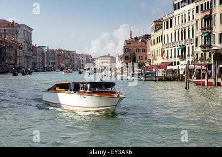 Motorboat cruising down the Grand Canal Stock Photo