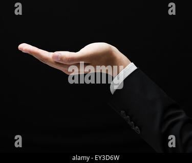 Open palm hand gesture of male Stock Photo