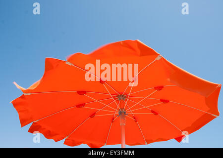 Umbrellas and sunbeds in Rimini and Riccione and Cattolica Beach, Italy Stock Photo