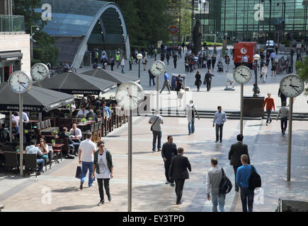 clocks outside canary wharf station in london docklands Stock Photo
