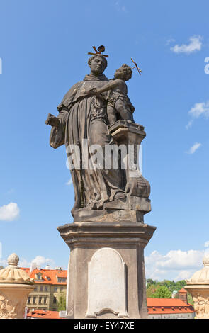 Statue of St. Anthony of Padua (circa 1707) on the balustrade of famous Charles Bridge in Prague (UNESCO site) Stock Photo