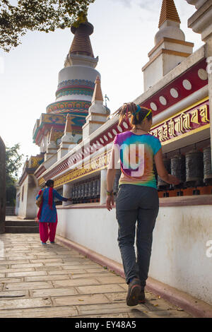 Girl in a sacred Buddhist temple Stock Photo