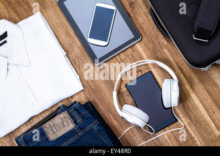 Informal male outfit with electronics, background Stock Photo