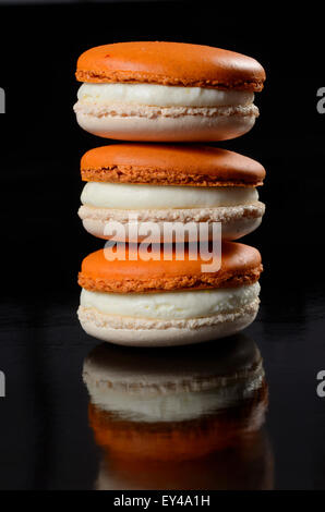 Stack of Orange Macarons Stock Photo